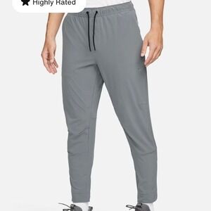 Nike Unlimited Mens Dri Fit Zippered Cuff Versatile Track Pants Smoke Gray Large
